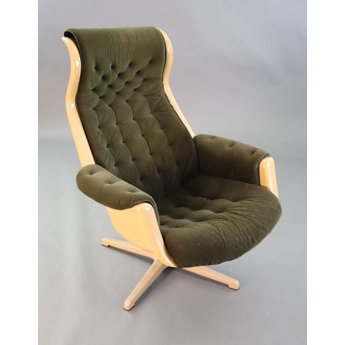 380 - A Svensson and Sandstrom Swedish moulded plastic chair,circa 1960, upholstered in buttoned brown fab... 