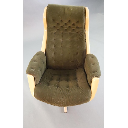 380 - A Svensson and Sandstrom Swedish moulded plastic chair,circa 1960, upholstered in buttoned brown fab... 