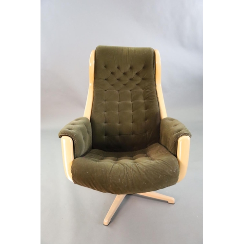 380 - A Svensson and Sandstrom Swedish moulded plastic chair,circa 1960, upholstered in buttoned brown fab... 