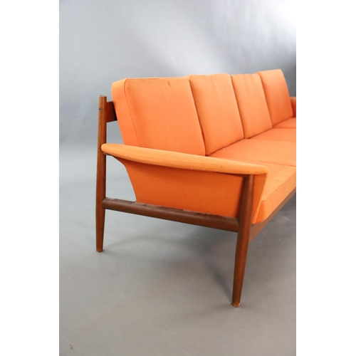 382 - A Grete Jalk for France & Son four seater sofa, with original burnt orange cloth upholstery and teak... 