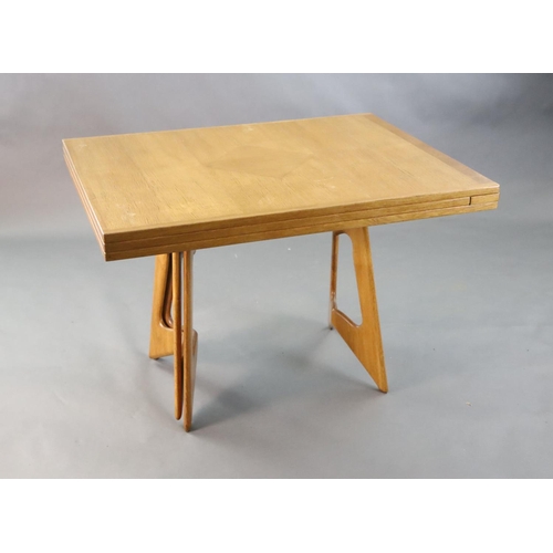 384 - A Guillerme & Chambron golden oak draw leaf dining table, with extending rectangular top on stylised... 