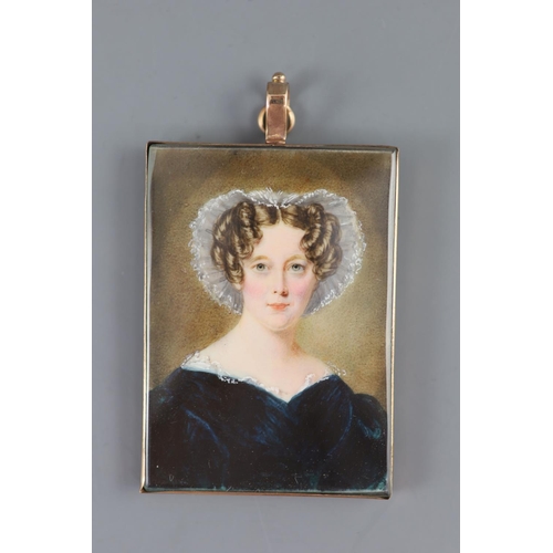 390 - William Egley (1798-1870)oil on ivoryPortrait miniature of a lady wearing a lace bonnet and green dr... 