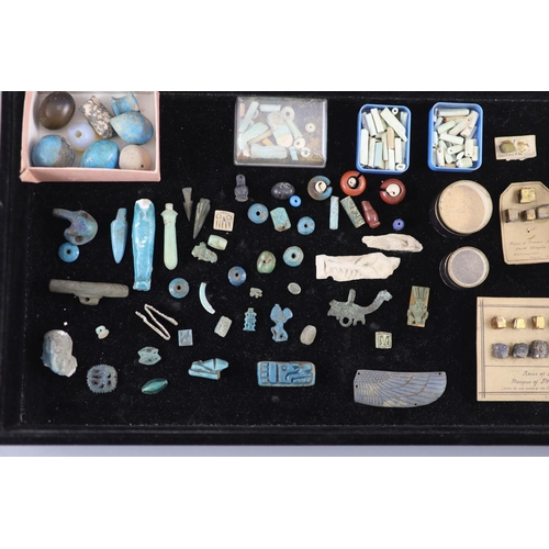 4 - A group of Egyptian stone and turquoise glazed faience amulets, beads and fragments, late Kingdom to... 