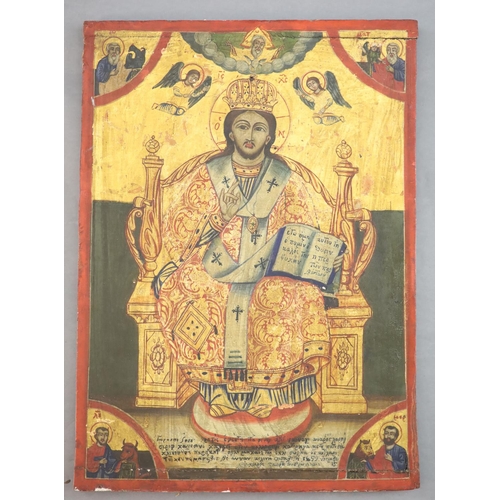 414 - A 19th century tempera on panel icon, probably Russian, depicting Christ Pantocrator, inscribed and ... 