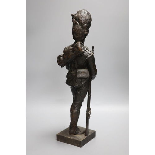 42A - Sir Joseph Edgar Boehm (1834-1890. A bronze figure of a Grenadier, signed J.E.BOEHM. SCR. and inscri... 