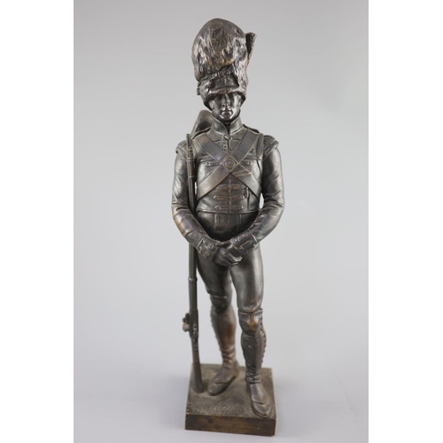 42A - Sir Joseph Edgar Boehm (1834-1890. A bronze figure of a Grenadier, signed J.E.BOEHM. SCR. and inscri... 