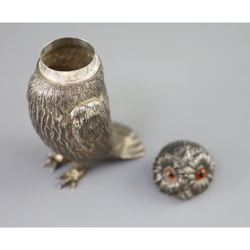 490 - A Victorian silver owl sugar sifter, having chased feather decoration and removable head inset glass... 