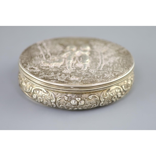 493 - A late 18th/early 19th century French silver oval box, with hinged cover, embossed with children and... 