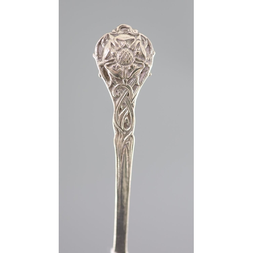 495 - A 1930's Arts & Crafts silver spoon, by Omar Ramsden, the terminal with rose and entwining briars, L... 