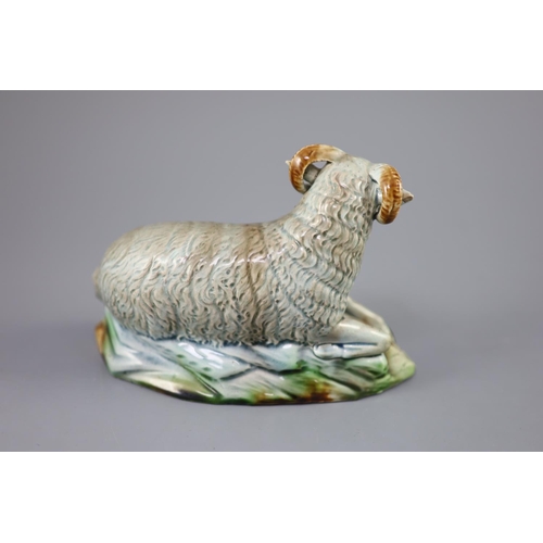 50 - A Ralph Wood the Younger polychrome pottery figure of a Ram, c.1780-90, on a hollow naturalistic bas... 