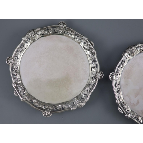 505 - A good pair of George II silver card trays by George Wickes, of shaped circular form, with pierced f... 