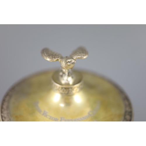 507 - A late 19th/early 20th century German parcel gilt 800 standard presentation pedestal cup and cover, ... 