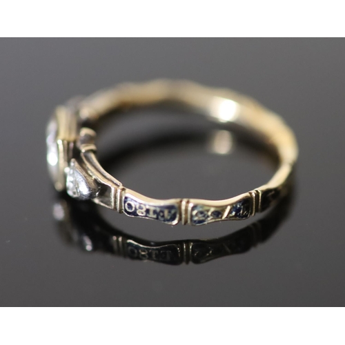 529 - An early George II gold, rock crystal rose cut diamond and black enamel memento mori ring, the centr... 