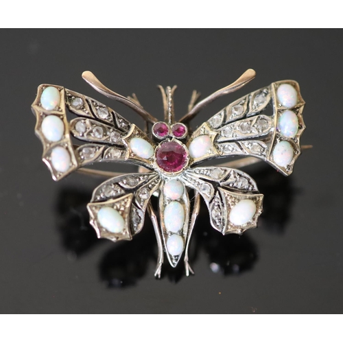 540 - An Edwardian gold and silver, rose cut diamond, white opal and ruby set butterfly brooch, width 43mm... 