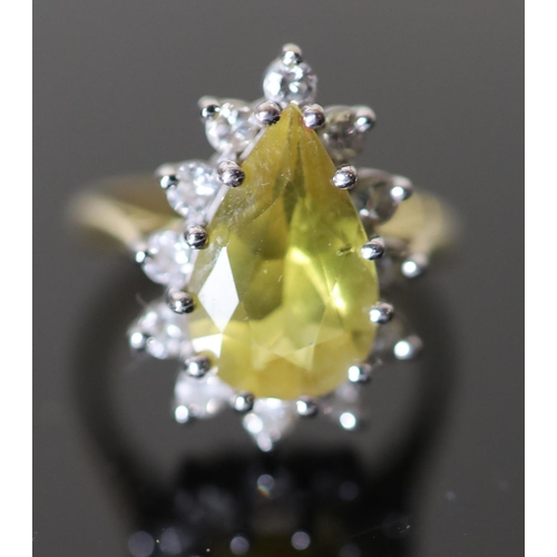 563 - A modern 18ct gold, pear shaped yellow tourmaline and diamond set cluster dress ring, size O, gross ... 