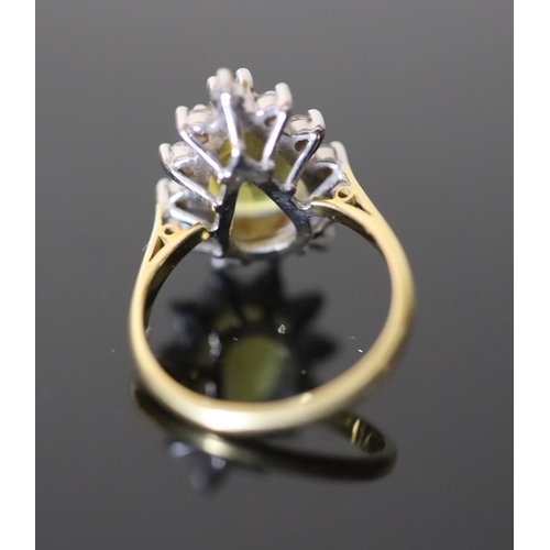 563 - A modern 18ct gold, pear shaped yellow tourmaline and diamond set cluster dress ring, size O, gross ... 