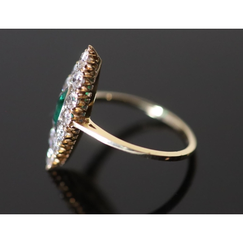 564 - A Victorian style gold, emerald and diamond cluster set marquise shaped ring, size O/P, gross 2.7 gr... 