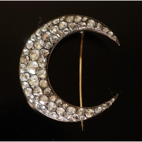 570 - A 19th century French gold and foil backed graduated rose cut diamond set crescent brooch, 41mm, gro... 