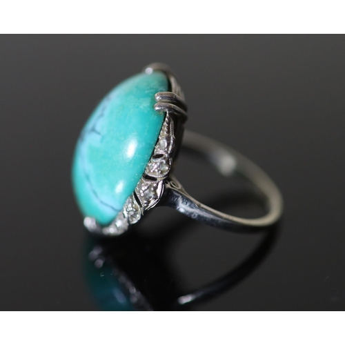 573 - A 20th century 18k white gold, cabochon turquoise and rose cut diamond chip set oval dress ring, siz... 