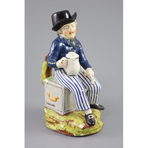 60 - An American Pearlware sailor Toby jug with hat, 'Success to our Wooden Walls, c.1820, on a naturalis... 