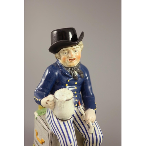 60 - An American Pearlware sailor Toby jug with hat, 'Success to our Wooden Walls, c.1820, on a naturalis... 