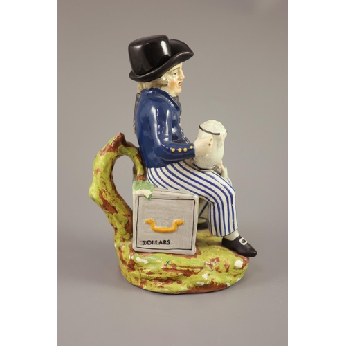 60 - An American Pearlware sailor Toby jug with hat, 'Success to our Wooden Walls, c.1820, on a naturalis... 