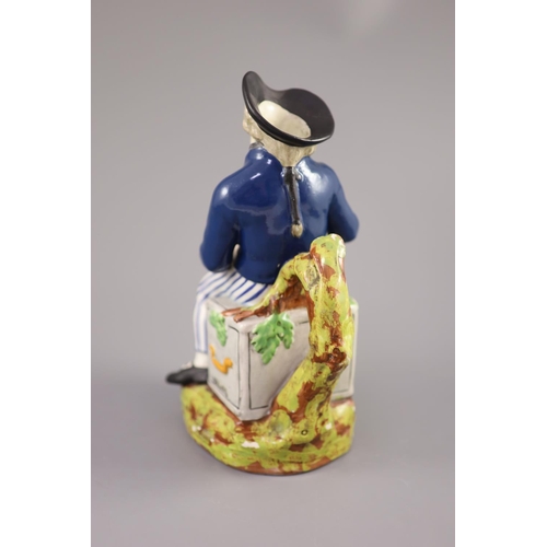 60 - An American Pearlware sailor Toby jug with hat, 'Success to our Wooden Walls, c.1820, on a naturalis... 