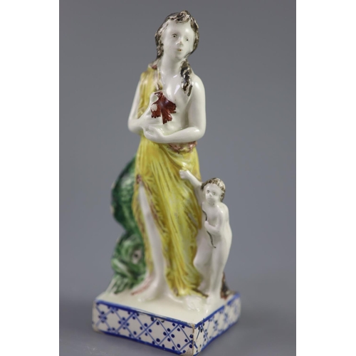 67 - An enamelled creamware figure of Venus, attributed Leeds Pottery, c.1790-1800, 16.2cm highCONDITION:... 