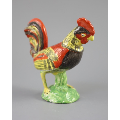 73 - A Staffordshire pearlware figure of a cockerel, c.1820, on a naturalistic mound base, 19cm highCONDI... 