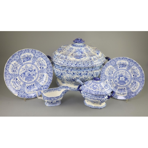 79 - An extensive Minton filigree pattern blue and white dinner service, c.1830, including a soup tureen,... 