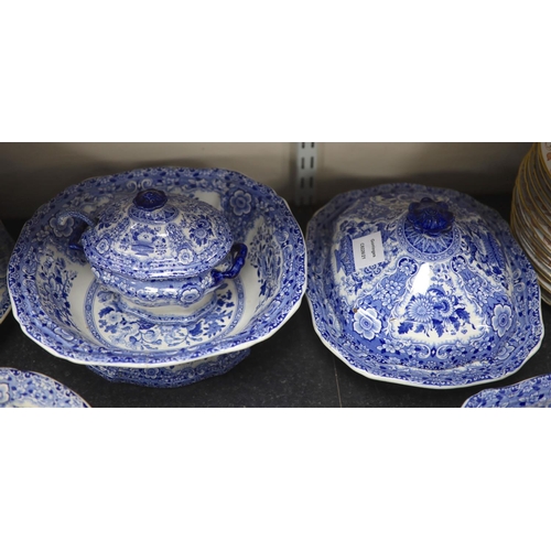 79 - An extensive Minton filigree pattern blue and white dinner service, c.1830, including a soup tureen,... 