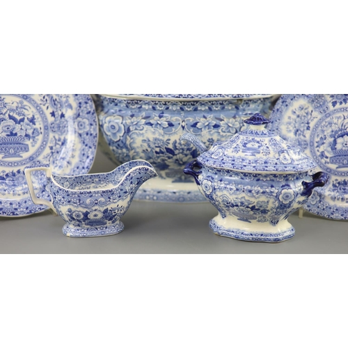 79 - An extensive Minton filigree pattern blue and white dinner service, c.1830, including a soup tureen,... 