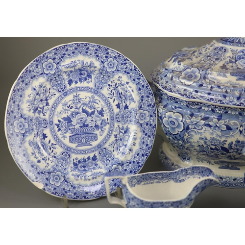 79 - An extensive Minton filigree pattern blue and white dinner service, c.1830, including a soup tureen,... 