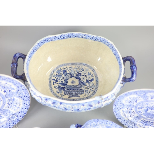 79 - An extensive Minton filigree pattern blue and white dinner service, c.1830, including a soup tureen,... 