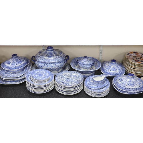 79 - An extensive Minton filigree pattern blue and white dinner service, c.1830, including a soup tureen,... 