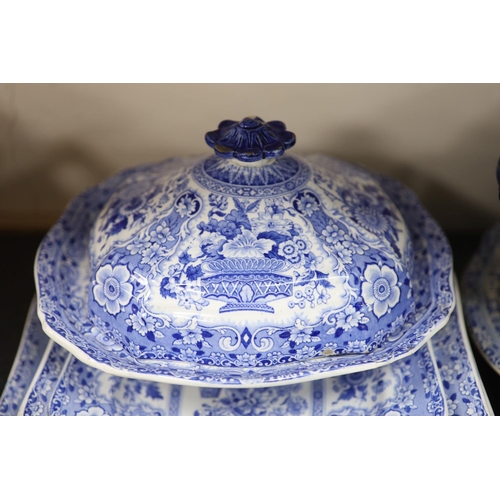 79 - An extensive Minton filigree pattern blue and white dinner service, c.1830, including a soup tureen,... 