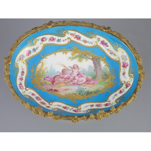 82 - A French Sevres style porcelain and ormolu mounted oval centrepiece dish, 19th century, the porcelai... 