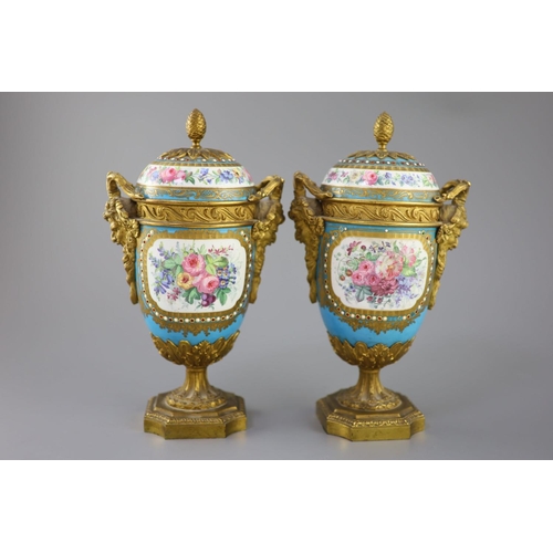 83 - A pair of French Sevres style porcelain and ormolu mounted vases and covers, 19th century, each pain... 