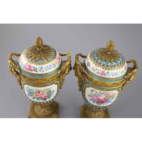 83 - A pair of French Sevres style porcelain and ormolu mounted vases and covers, 19th century, each pain... 