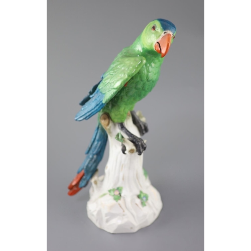 86 - A large Meissen model of a colourful parrot, late 19th century, the figure seated upon a tree stump ... 