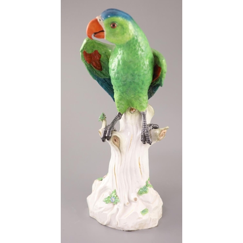 86 - A large Meissen model of a colourful parrot, late 19th century, the figure seated upon a tree stump ... 