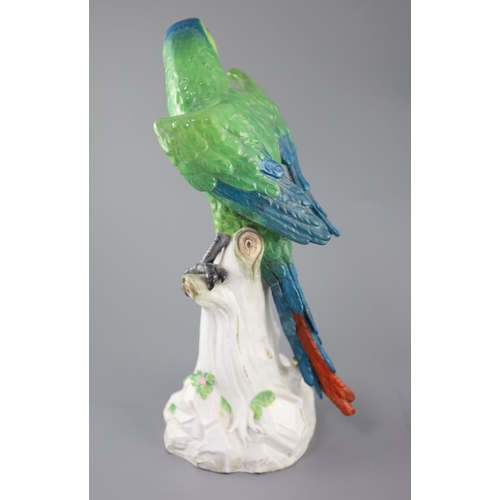 86 - A large Meissen model of a colourful parrot, late 19th century, the figure seated upon a tree stump ... 