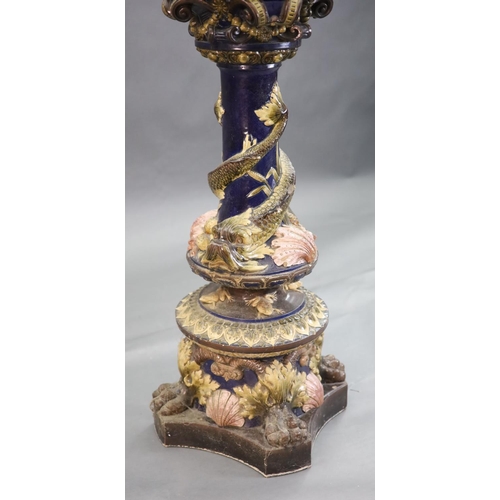 91 - A Continental Palissy style grotesque pottery jardiniere and associated pedestal, late 19th century,... 