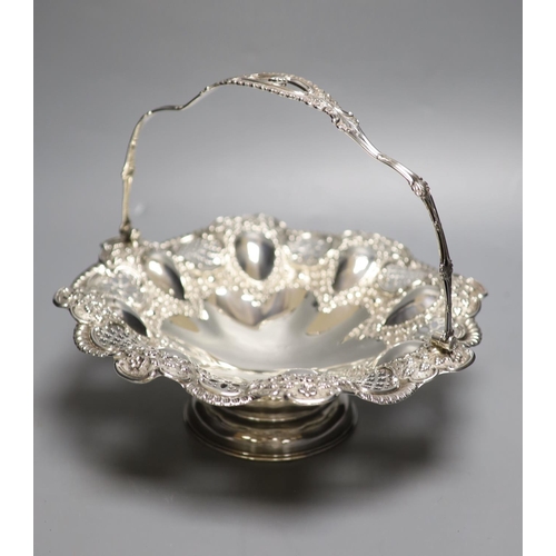1713 - An Edwardian embossed silver fruit basket, Joseph Rodgers & Sons, Sheffield, 1903, 28cm, 19oz.CONDIT... 
