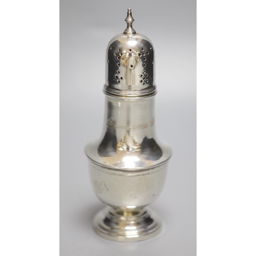 1714 - A 1960's silver sugar caster, with engraved inscription, 18cm, 4.5oz (a.f.).