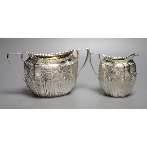 1716 - A late Victorian embossed silver sugar bowl and cream jug, James Dixon & Sons, Sheffield, 1896/7, 17... 