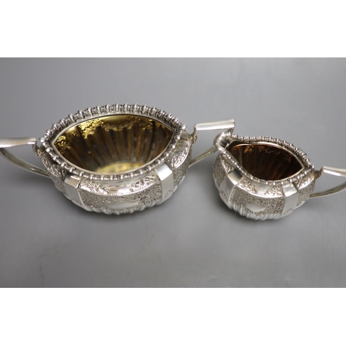 1716 - A late Victorian embossed silver sugar bowl and cream jug, James Dixon & Sons, Sheffield, 1896/7, 17... 