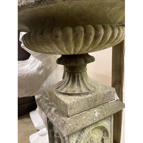 1 - A reconstituted stone campana garden urn on pedestal, diameter 54cm, height 92cm