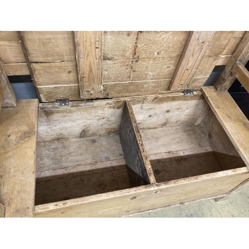 14 - A 19th century East European pine box seat settle, length 110cm, depth 50cm, height 98cm
