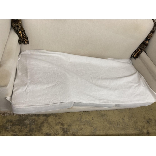19 - An upholstered Knowle settee, length 184cm, depth 80cm, height 104cm